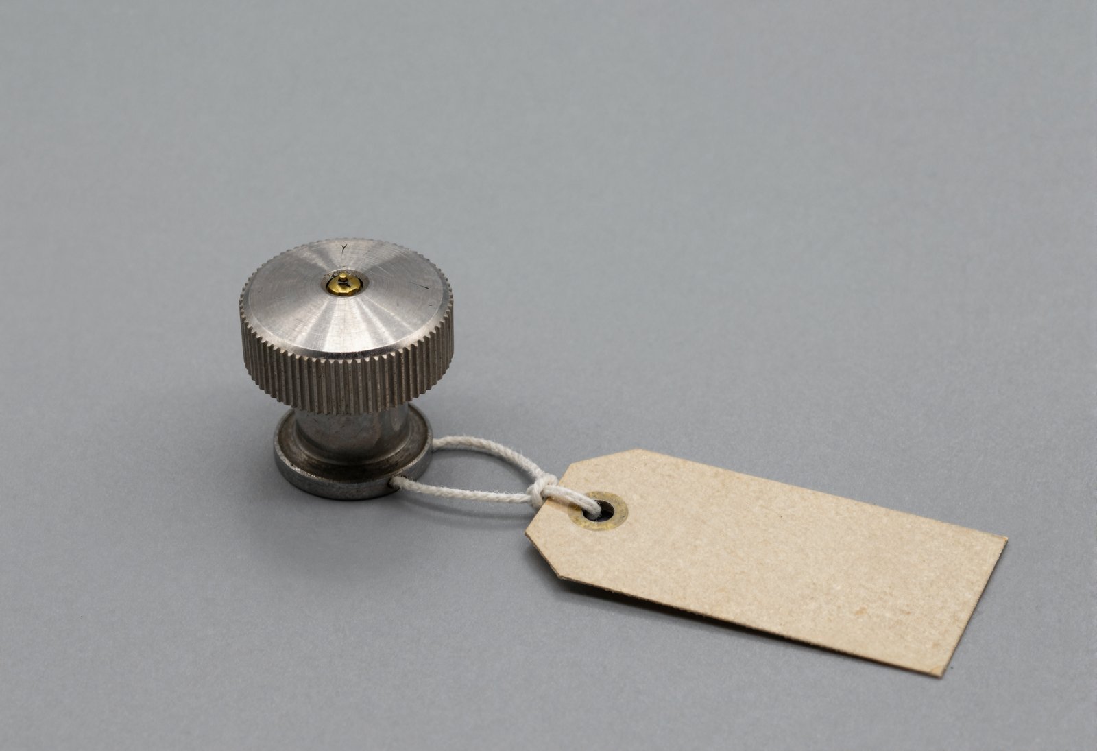 Fig. 1 — Instrument specimen, catalogued. The Bureau measured discrimination against knurl spacing of this type.